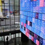 Why Japanese stocks rose as government bond yields and the yen fell after rate hike